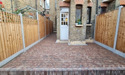 Mixt clay pavers patio: Stylish East London home exterior transformation.