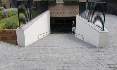 Argent Block Paving Dark leading into a stylish, functional ramp.