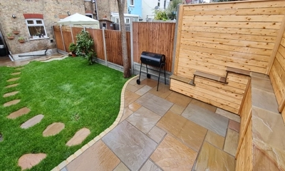 Seamless transition from new close board panels to Siberian larch fencing.