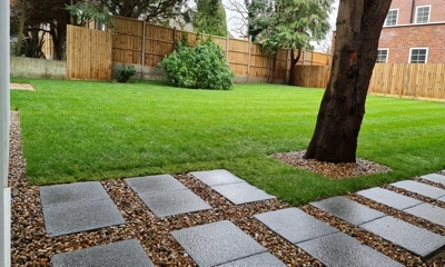 Freshly laid lawn, a verdant canvas in the garden's transformation