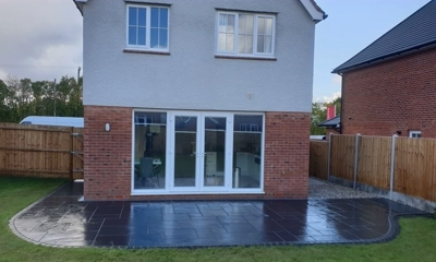 Brazilian black slate patio shows timeless elegance, durability, available in various sizes. 