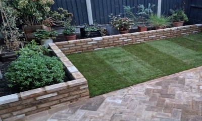   planter wall constructed with the sophistication of Montreal Maple Paving Brick.