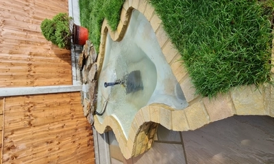 If your pond is more about aesthetics and relaxation than attracting local wildlife. you may want to consider a waterfall pond