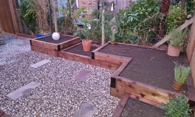 Wood sleeper ideas for planters into back garden 